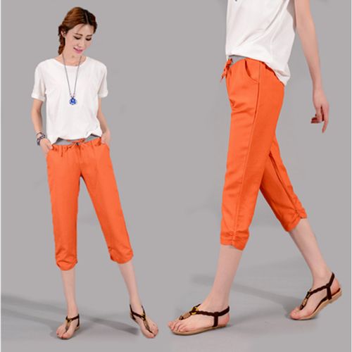橘色裤子搭配什么颜色上衣最佳